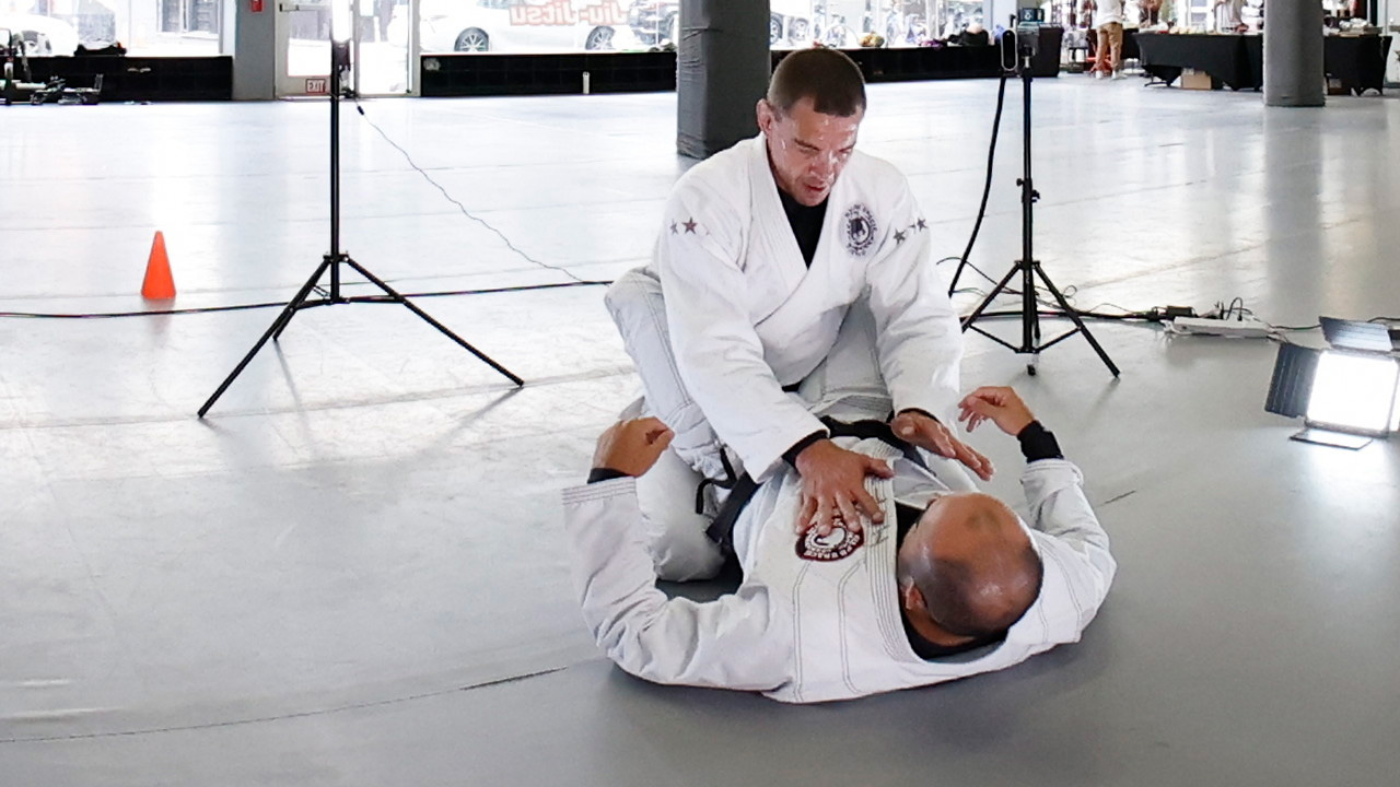 Two men in a jiu jitsu grapple